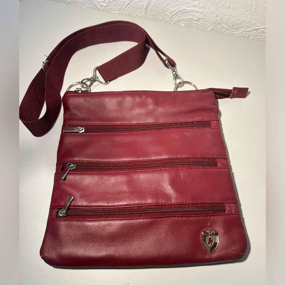 Heys Burgundy Multi Zipper Cross Body Bag